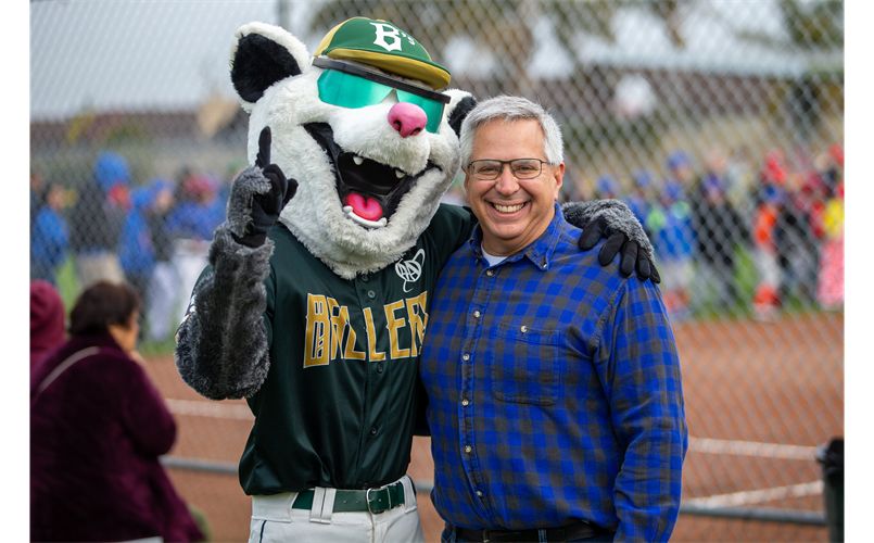 Mayor Juan Gonzalez with Scrappy The Rally Possum at Opening Day